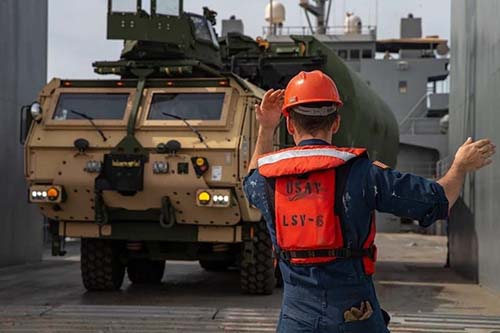 Transportation Soldier unloading a US Army vessel.