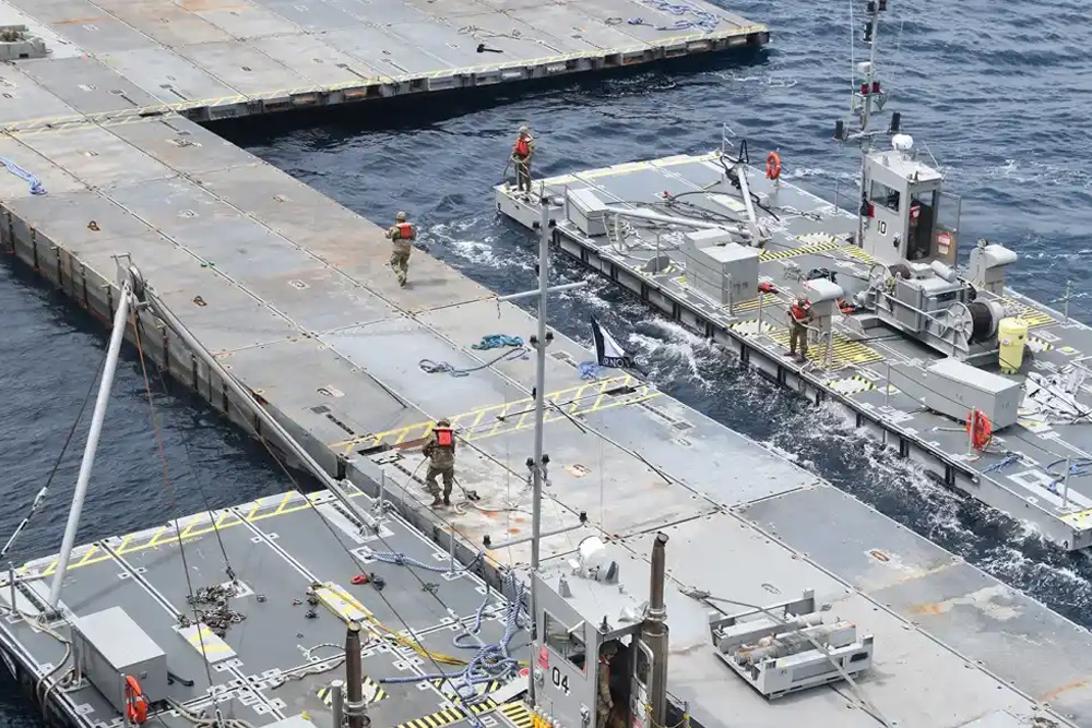 Construction of a temporary floating pier off the coast of Gaza to help deliver aid to the strip is seen in this photo posted on social media by US Central Command on April 30, 2024. (U.S. Central Command)