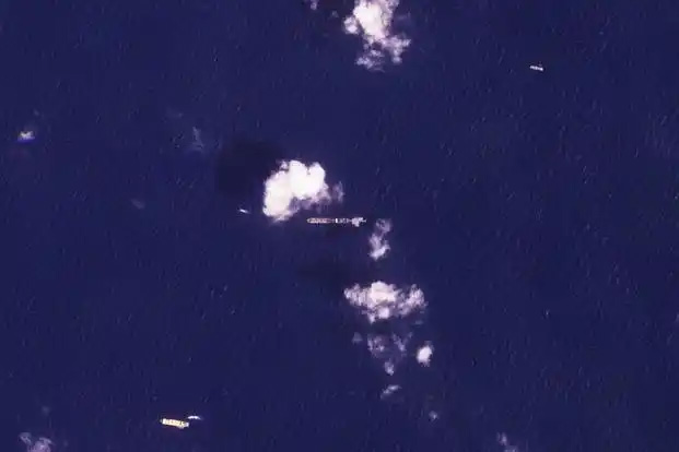 This satellite photo from Planet Labs PBC shows the USNS Roy P. Benavidez, center, in the Mediterranean Sea off shore from the Gaza Strip on Monday, April 29, 2024. (Planet Labs PBC via AP)