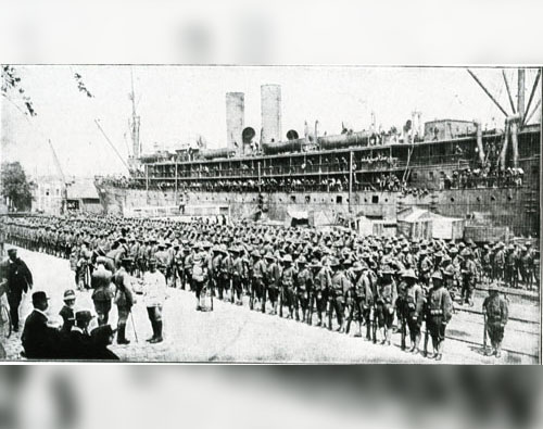 U.S. Troops disembark from a troopship in France, 1918.  – US Army Transportation Museum Collection