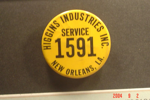 Employee Badge for Higgins Industries in New Orleans, LA which built the famed “Higgins” Boats that enable all the major amphibious landings of World War II.  Part of the collection of the U.S. Army Transportation Museum.