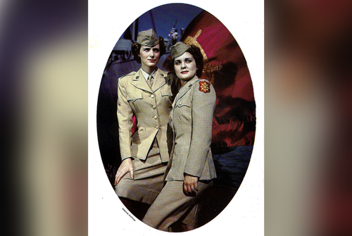 A World War II colorized photos showing two Women’s Army Corps (WAC) Transportation Corps Soldiers wearing the Port of Embarkation Shoulder Sleeve Insignia.