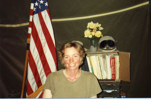 CPT Renee Miller of the 24th Transportation Battalion relaxes in her field tent in Somalia during operations in 1993. Part of the research collection of the U.S. Army Transportation Museum.