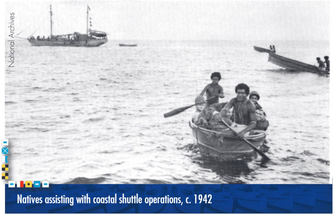 Natives assisting with coastal shuttle operations. c. 1942. Photo from the National Archives.