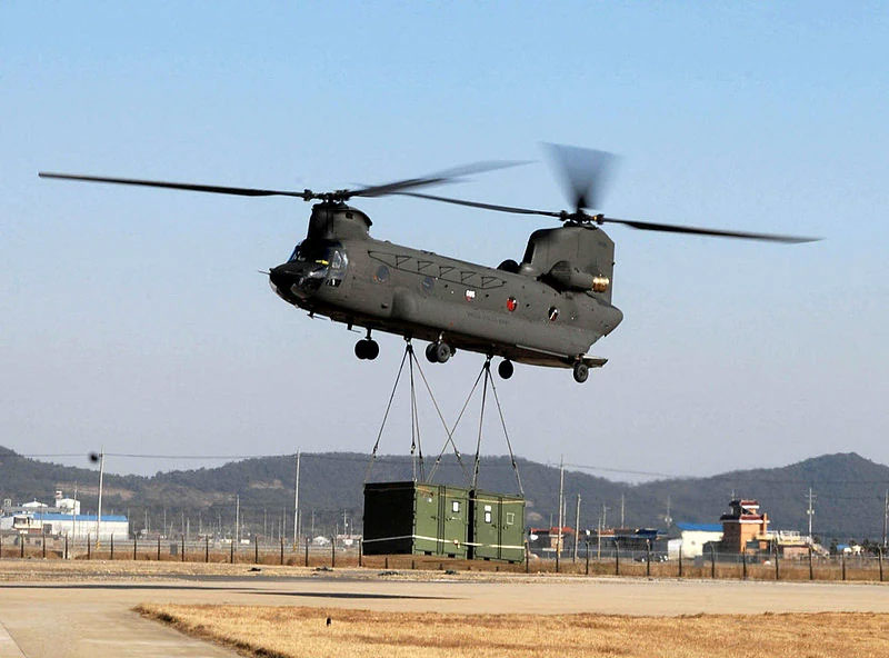 A Chinook moving cargo.