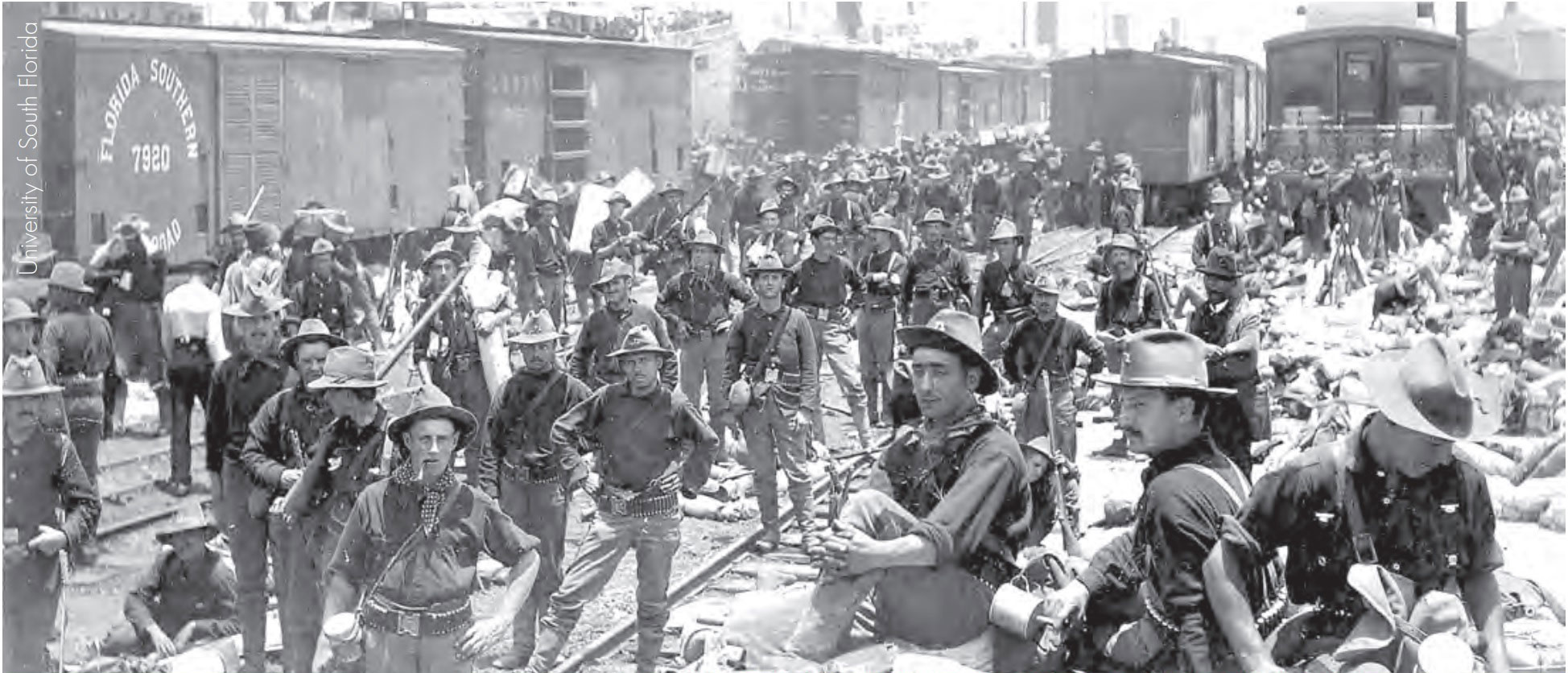  Soldiers of the 71st New York Volunteer Infantry wait with their gear at the port of Tampa. 