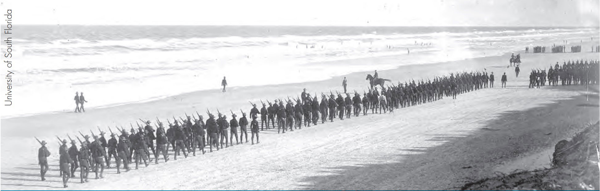 Troops of the 3d Nebraska Volunteer Infantry march along Pablo Beach near Jacksonville, Florida, c. 1898. 