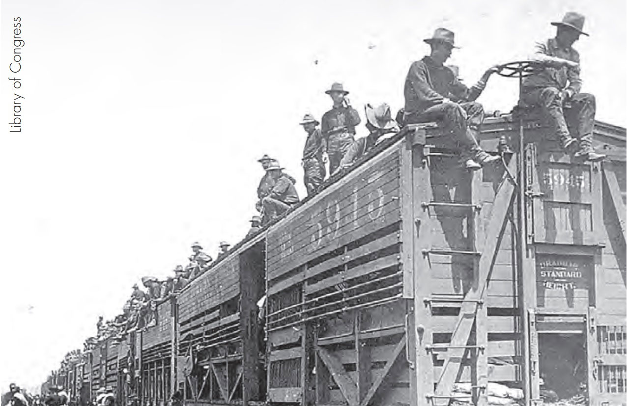 U.S. troops arrive aboard railcars in Tampa, c. 1898.