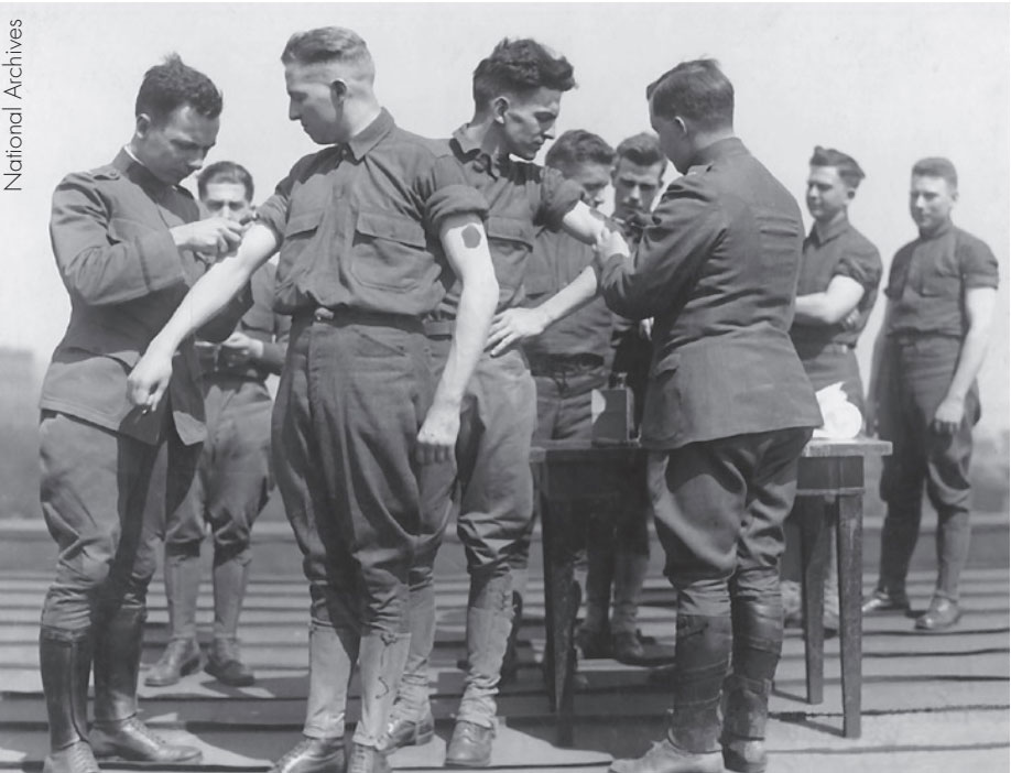 Soldiers receiving immunizations, c. 1917