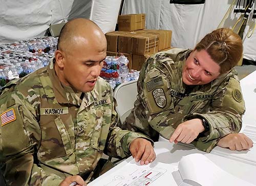 US Army soldier communicating with each other.