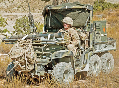 John Deere M-Gator being used in a field environment.