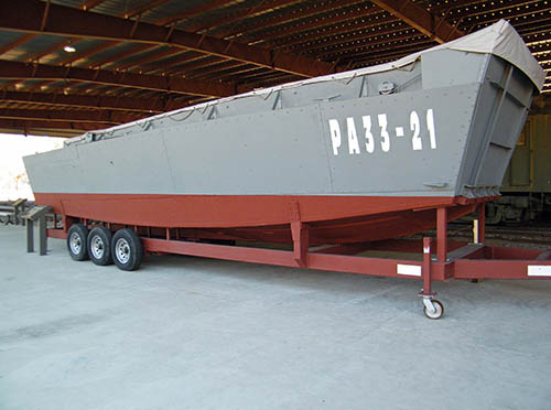 The side view Landing Craft Vehicle Personnel (LCVP) on exhibit at the TC Museum.