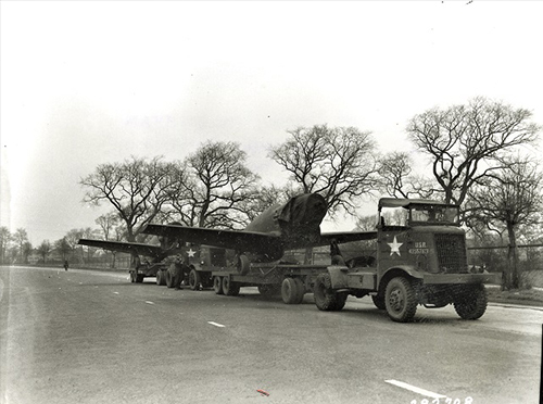 Tractor hauling an aircraft.