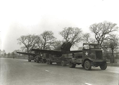 Tractor hauling an aircraft.