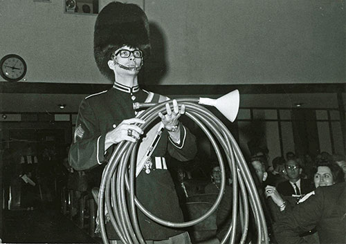 U.S. military bands of the mid-20th Century, the wearing of the high fur hat,was limited to the band Drum Major.