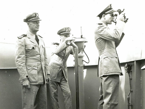 Soldiers using a sextant for celestial navigation.