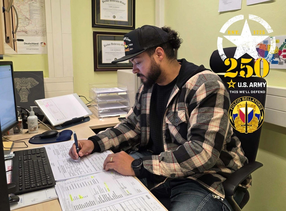 Courtesy Photo | Gary Alderman works at his office, April 16. The Logistics Readiness Center Wiesbaden transportation assistant said, “the Army is my family outside of my family. I’m proud and happy to be a part of this special community, especially on this special year and special occasion. Happy 250th birthday, U.S. Army!” (U.S. Army courtesy photo)