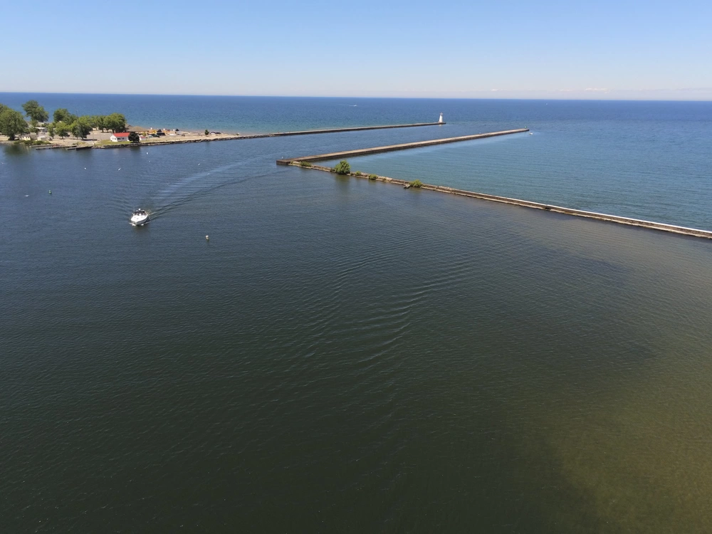 Courtesy Photo | Piers and breakwaters at the mouth of Great Sodus Bay on Lake Ontario in Sodus Point, N.Y., June 15, 2022. The U.S. Army Corps of Engineers maintains federal navigation structures at harbors like Great Sodus' across the Great Lakes Navigation System. (U.S. Army photo by USACE Buffalo District)