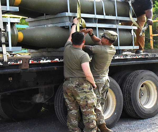 Photo By Julia Hawkins | Soldiers from the 1245th Transportation Company ensure that critical munitions are securely strapped and ready for transport. This task is part of the Operation Patriot Press mission, which provides soldiers with hands-on logistical training for rapid deployment scenarios.