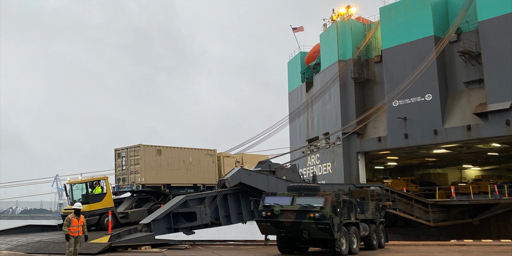 Photo By Greg Wilson | The ARC DEFENDER delivers armored vehicles and equipment January 26, 2023, at the port in Riga, Latvia, in support of Operation Atlantic Resolve.
