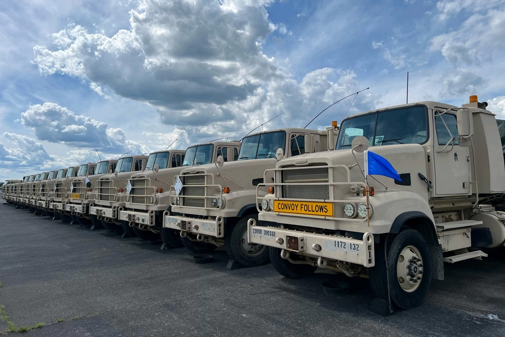 U.S. Army National Guard trucks, belonging to the 1172nd Transportation Company, 30th Combat Sustainment Support Battalion, staged before a four-day mission, Tennessee, May 30, 2024. (U.S. Army National Guard photo by Capt. AJ French)