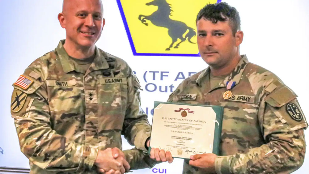 Maj. Gen. Matthew D. Smith awards the Soldier Medal to Sgt. 1st Class Aaron S. Lemon, a Missouri Army National Guard Soldier, for rescuing a mother and two toddlers from drowning while attempting to cross the Rio Grande River south of Eagle Pass, Texas on Dec. 17, 2022