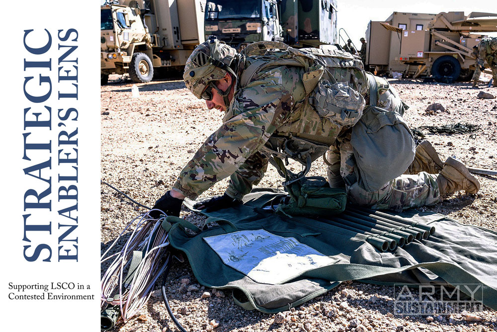 Cpl. Brandon McCray, a signal support systems specialist assigned to the 87th Division Sustainment Support Battalion, 3rd Division Sustainment Brigade, 3rd Infantry Division, sets up communications equipment during the National Training Center rotation 23-05 at Fort Irwin, California, March 2, 2023. (Staff Sgt. Jared T. Scott)