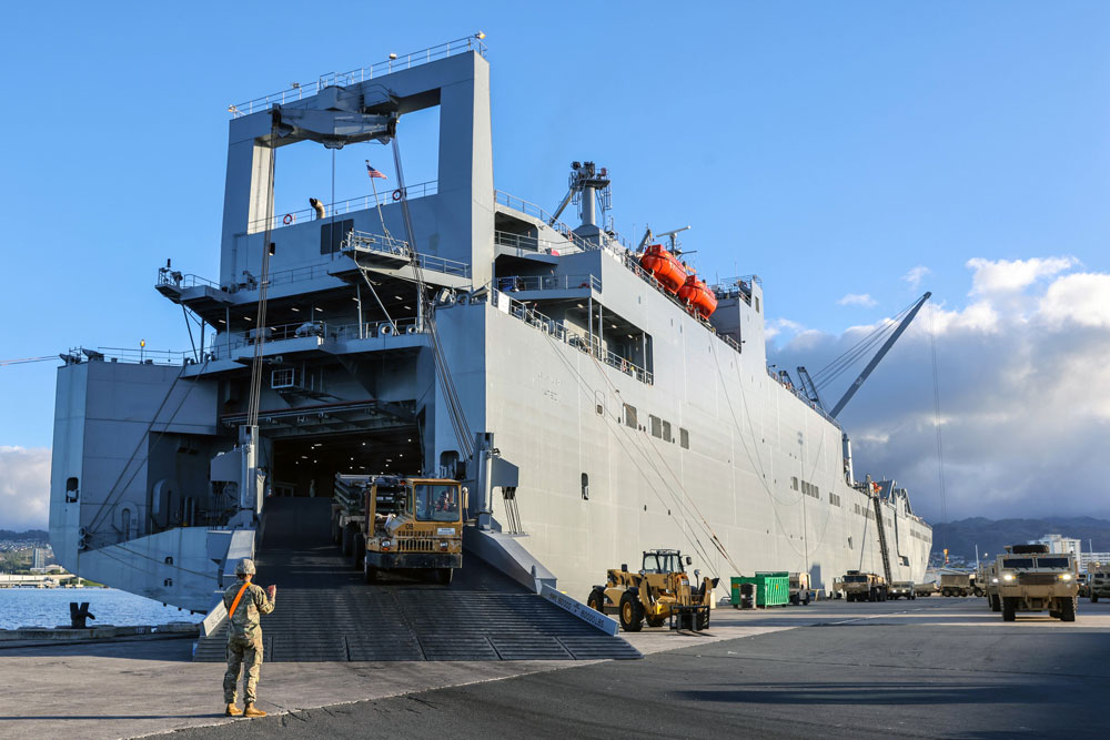 Soldiers assigned to 8th Theater Sustainment Command, 25th Infantry Division, 599th Transportation Brigade, 402nd Army Field Support Brigade, Department of Defense Contractors, and elements from the U.S. Navy offload military vehicles as part of the Army Pre-positioned Stock 3 Fix-Forward (Afloat) from the U.S. Naval Ship Watson at Honolulu, Hawaii, Dec. 1, 2022. (Photo Credit: Sgt. Kyler Chatman) 