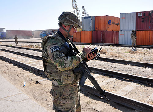 Soldiers from the Transportation Corps training in rail yard.