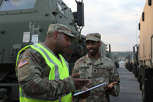 Transportation Soldiers coordinating transportation movement.