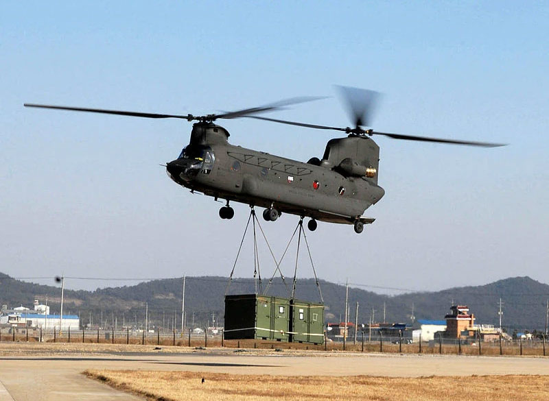  Helicopter transporting air cargo.