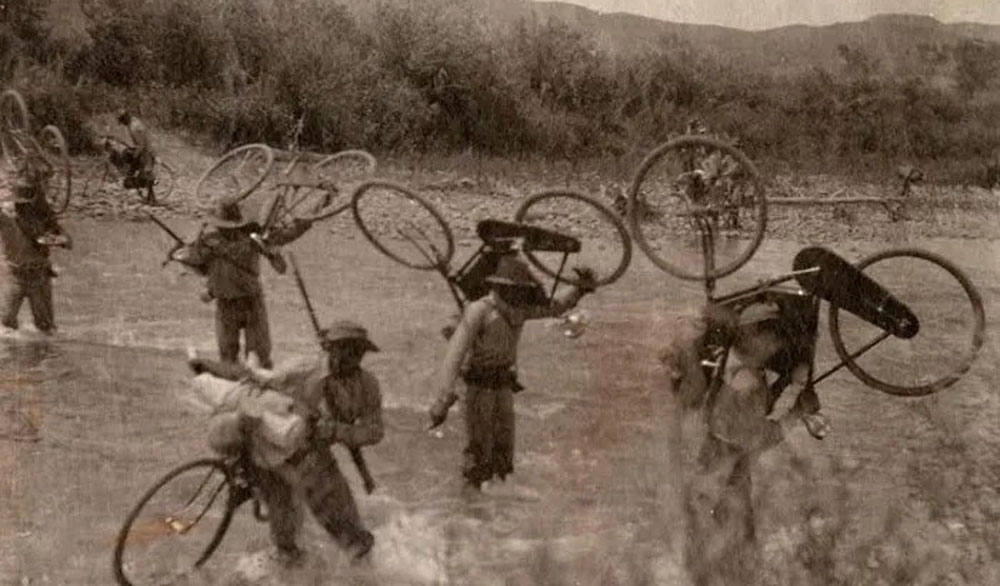 The Buffalo Soldiers often had to carry their bikes over swift-running rivers and streams. National Archives