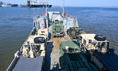 Soldiers from 18th Field Artillery Brigade work with Soldiers from 7th Transportation Brigade to conduct vessel load training Feb.8,2023 at Joint Base Langley-Eustis. The training allows Soldiers to work with other units to complete one shared mission.