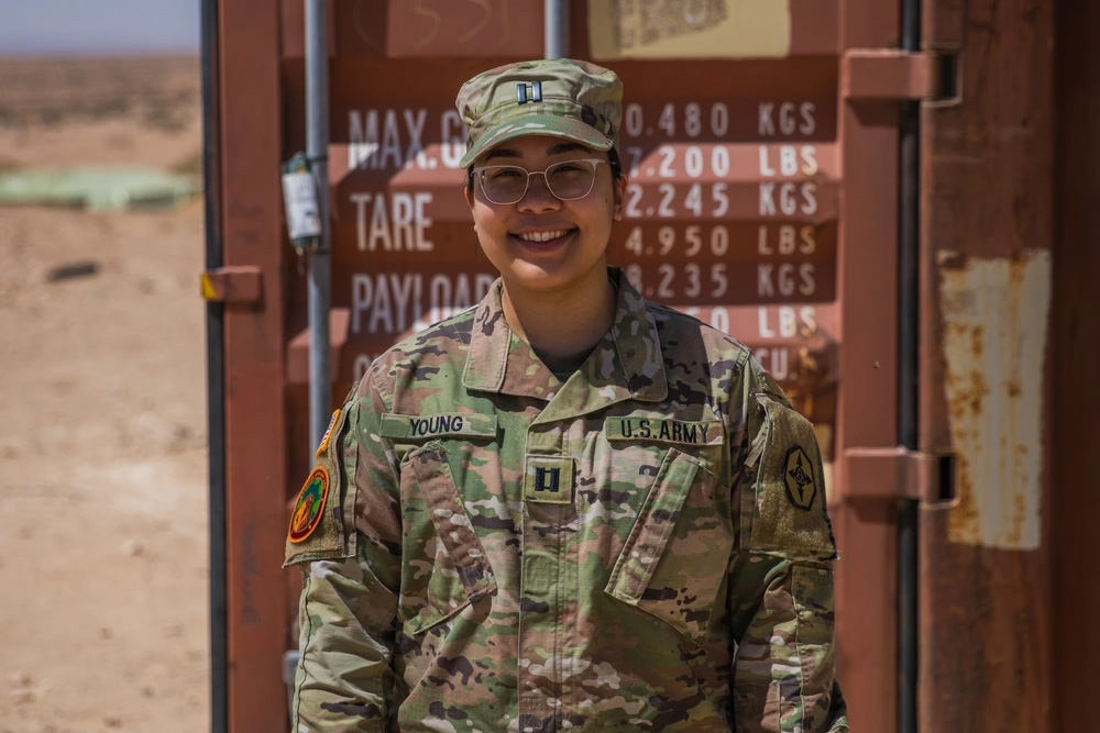 U.S. Army Capt. Ivy Young, commander of the 970th Transportation Detachment, a U.S. Army Reserve unit based in Eugene, Oregon, poses for a photo during exercise African Lion 2024 (AL24) in Ben Ghilouf, Tunisia, May 5, 2024. Young leads the movement control team responsible for transporting personnel and equipment throughout Tunisia during the course of the exercise. AL24 marks the 20th anniversary of U.S. Africa Command’s premier joint exercise led by U.S. Army Southern European Task Force, Africa (SETAF-AF), running from April 19 to May 31 across Ghana, Morocco, Senegal and Tunisia, with over 8,100 participants from 27 nations and NATO contingents. (U.S. Army photo by Maj. Joe Legros)